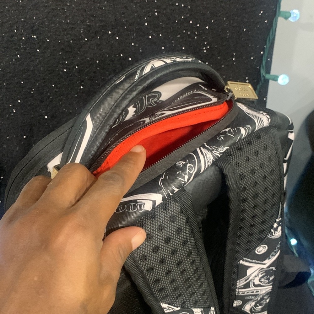 I am selling a new addition, black and white backpack